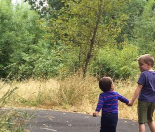 My sons exploring outside together | Amy Kober