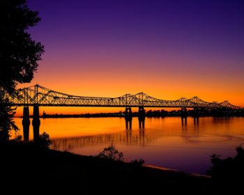 Sunset at a bridge over the Mississippi River