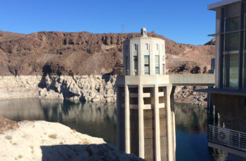 Structural pillar at Hoover Dam with Lake Mead’s ominous ‘bathtub ring’ in the background | Sinjin Eberle