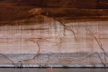 Lake Powell’s ‘bathtub ring’ hovers more than 50ft about paddler Sinjin Eberle, December 2015 | Forest Woodward