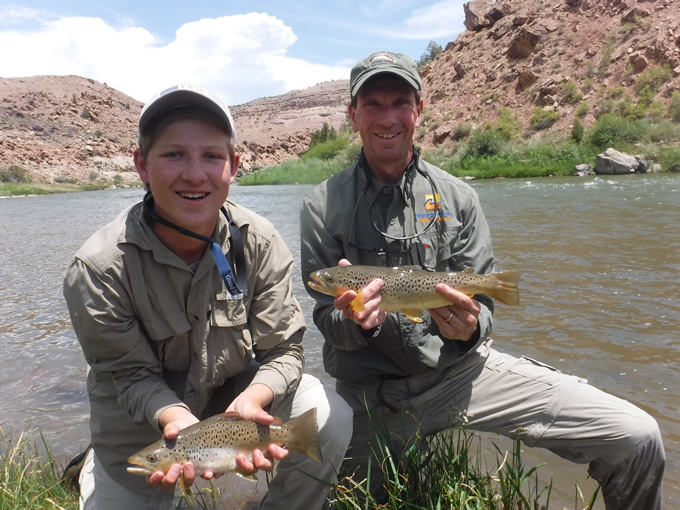 Steve White fishing on the Gunnison River with his son, Luke. | Steve White