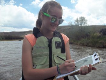 A young RRAFT participant maps the Gunnison on her rafting trip. | Dan Omasta
