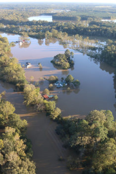 Flooding from Hurricane Matthew damages homes near Selma, North Carolina, October 12, 2016. | U.S. Army National Guard