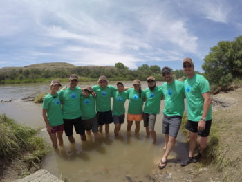 RRAFT participants pause for a photo along the Gunnison River. | Dan Omasta