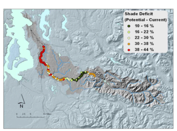 Much of the Green River is bordered by parking lots and asphalt trails. This figure shows the effective shade deficit by 1,000 m increments. The deficit is the difference between the mature riparian shade condition (i.e., lots of trees) and the current riparian shade condition (i.e., lots of roads and buildings). | Washington Department of Ecology