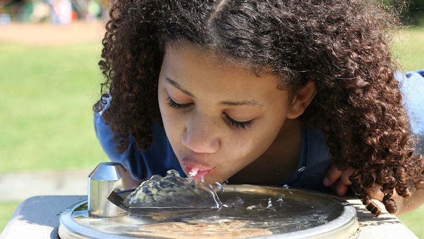 Drinking from a water fountain | Photo courtesy of the CDC