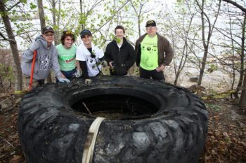 Volunteers show off their big find at the 4th Annual Black River Clean-up. | Stephanee Moore Koscho