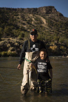 Louie Hena and his grandson fishing on the Rio Grande. | Dana Romanoff