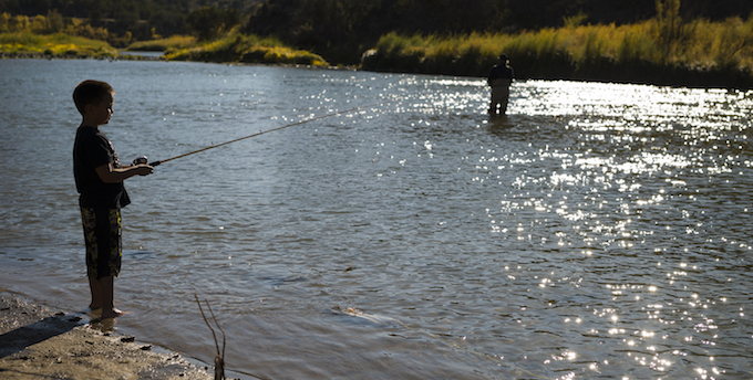 Louie Hena and his grandson fish the Rio Grande River. | Dana Romanoff