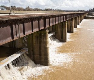 The Sacramento Weir that diverts water from the Sacramento River to the Yolo Bypass. | Andrew Nixon