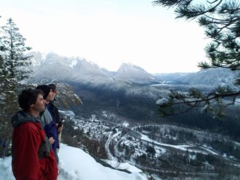 Hikers: Nick Baughman, Dave Moroles, Kevin Hoffman. The Skykomish Valley seen from the Index Wall. | Photo by Nick Baughman