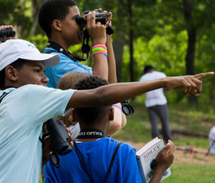 Children bird watching along the Pearl River in LeFleur’s Bluff State Park. | Chris King