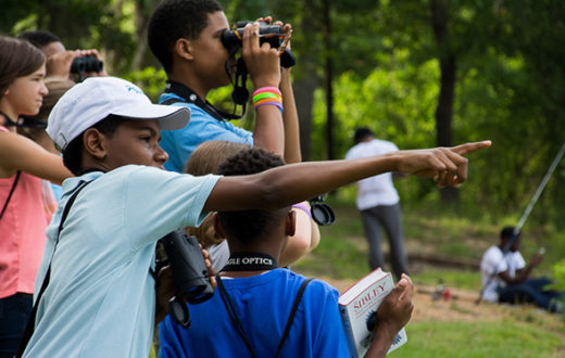 Children bird watching along the Pearl River in LeFleur’s Bluff State Park. | Chris King