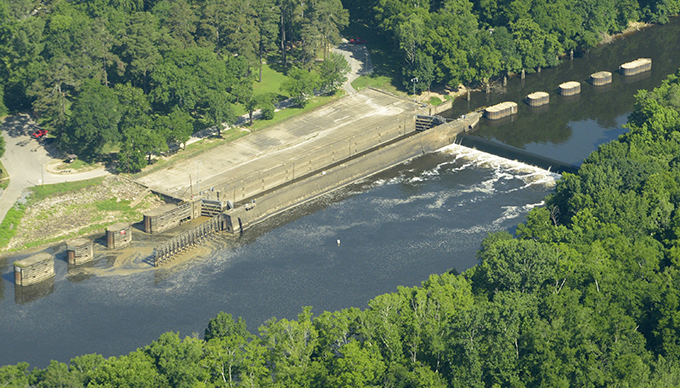 Lock and Dam #3. South Wings volunteer pilot Hap Endler flew up the Cape Fear River for photographs of Eagles Island and the Battleship North Carolina, the State Port at Wilmington and its wood pellet operation and the three Locks and Dams between Wilmington and Fayetteville. Photo by Alan Cradick, overflight provided by South Wings, June 15, 2015.
