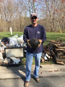 Volunteer with bowling ball | Christina River, DE | Photo by Andrea Stewart