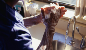 Doctor Washing Hands | Photo by Keith Brofsky