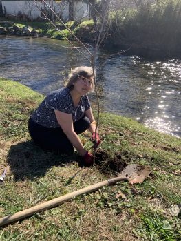 The author, planting along the banks of the Tuckasegee River
