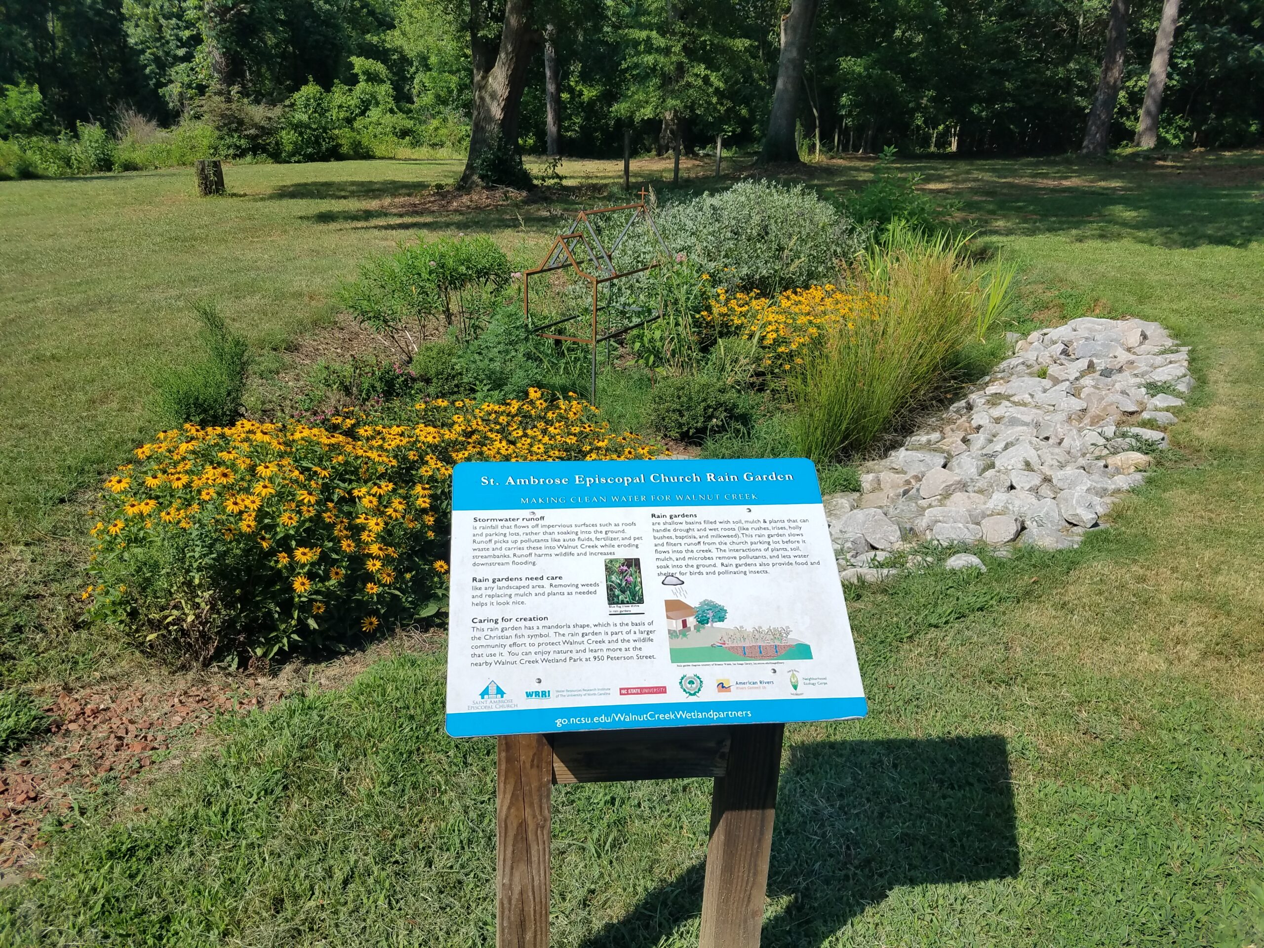 Sign for the St. Ambrose Rain Garden | Photo by Peter Raabe