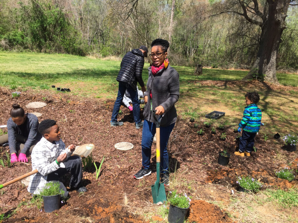 Community members planting a rain garden | Photo by Christy Perrin