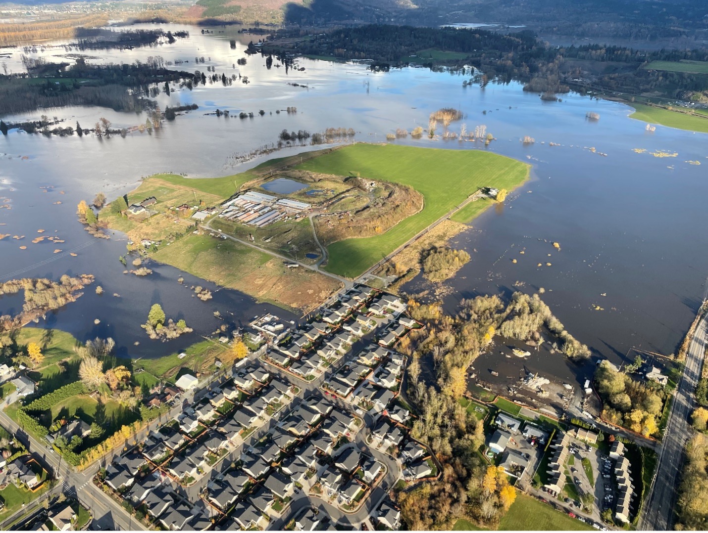 New development under construction in the Skagit shown during flooding on November 16, 2021. Photo Credit: Brandon Parsons, American Rivers with aerial support by LightHawk.