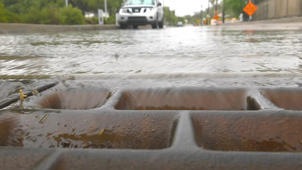 Storm drain during flooding in Tuscan, Arizona | Photo by Sinjin Eberle