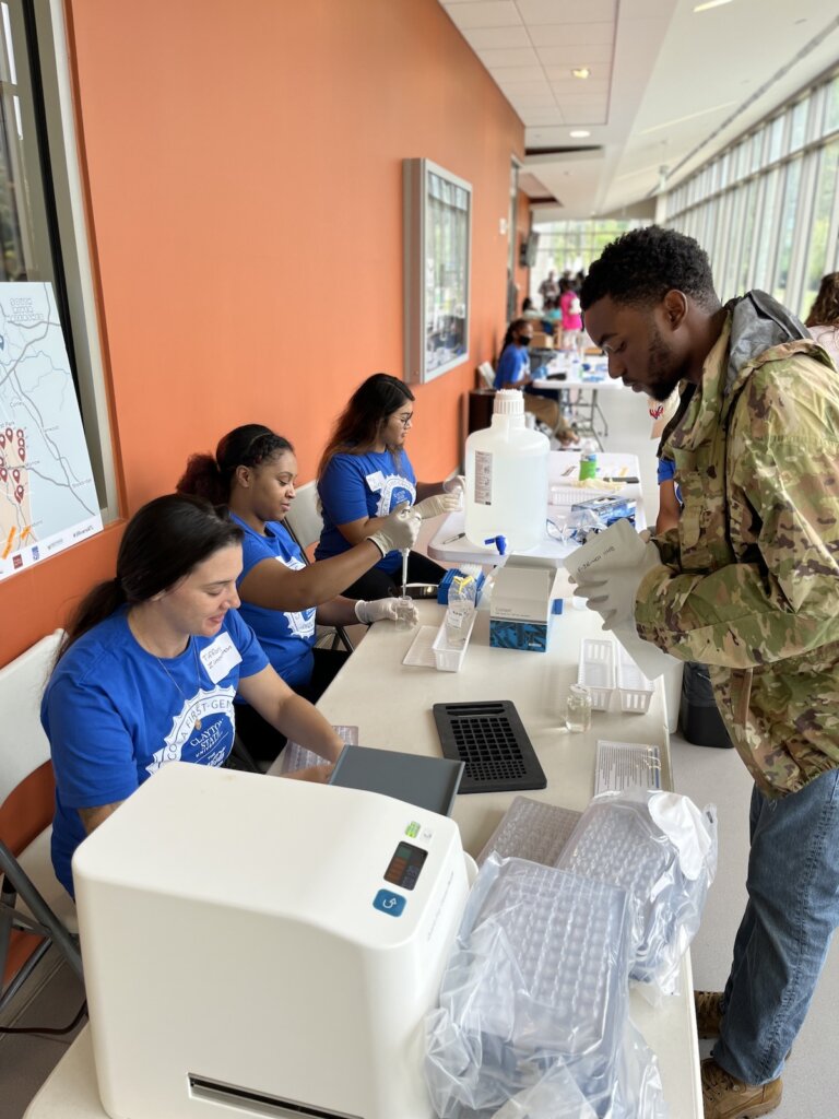 Students at Clayton State University helping set up the event - Photo by Carli Pelizzo