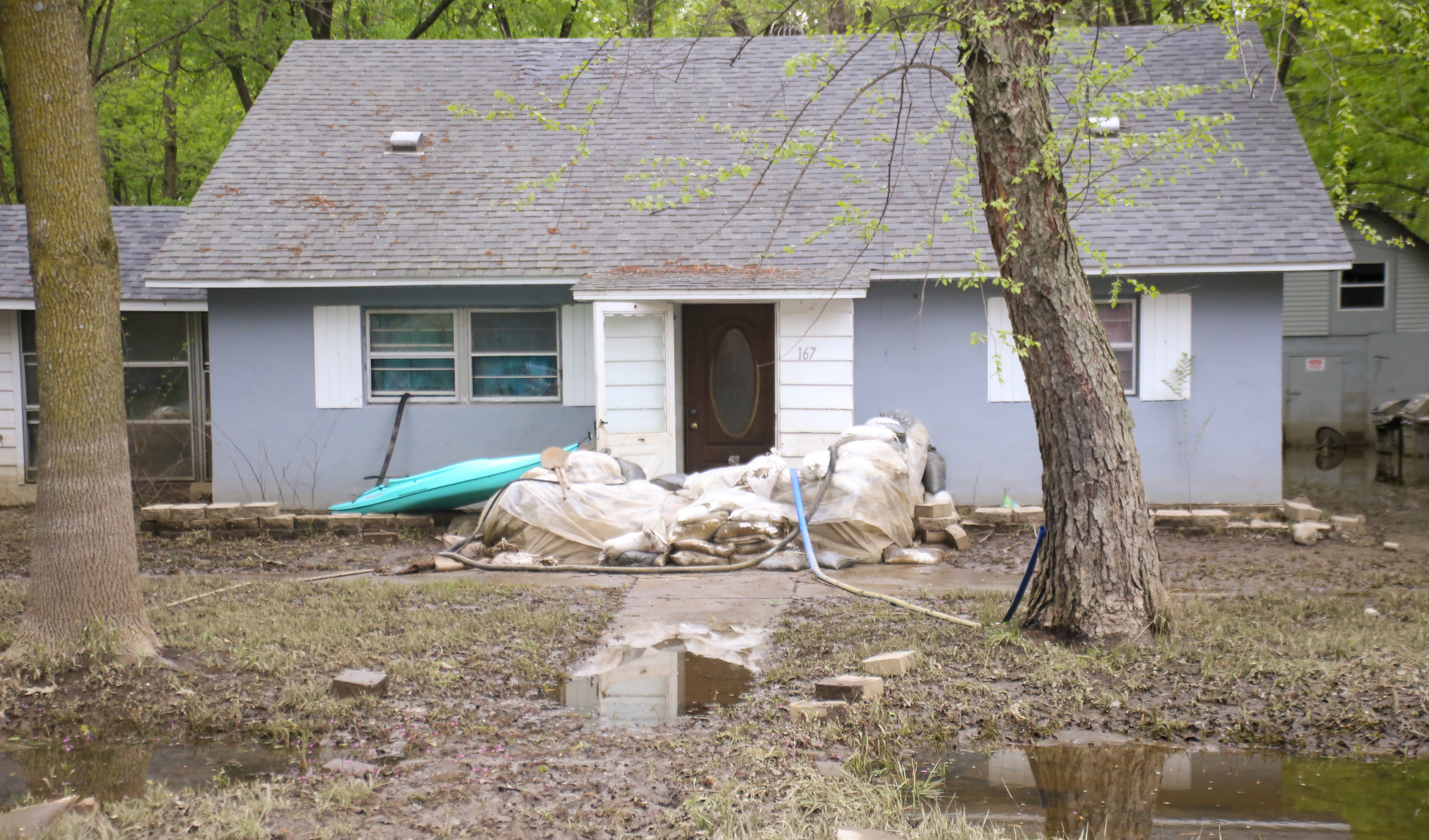 Damaged house after flooding in Illinois | Crystal Dorothy