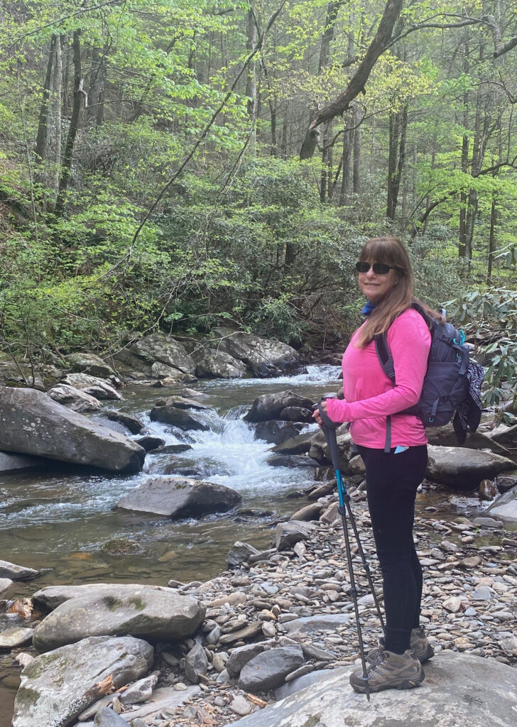 Lisa Perras Gordon hiking along the Oconaluftee River