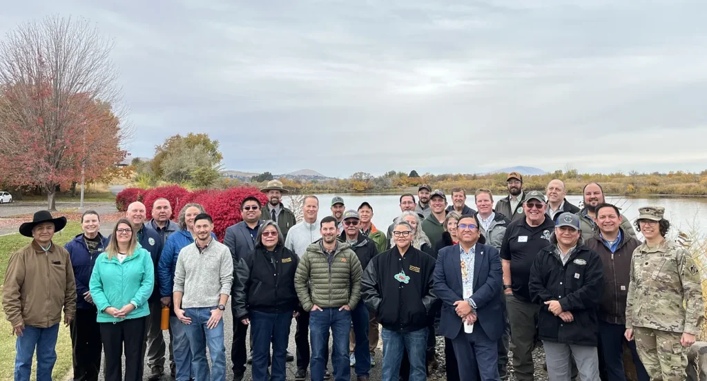 Project partners with Bateman Island causeway in background | WDFW